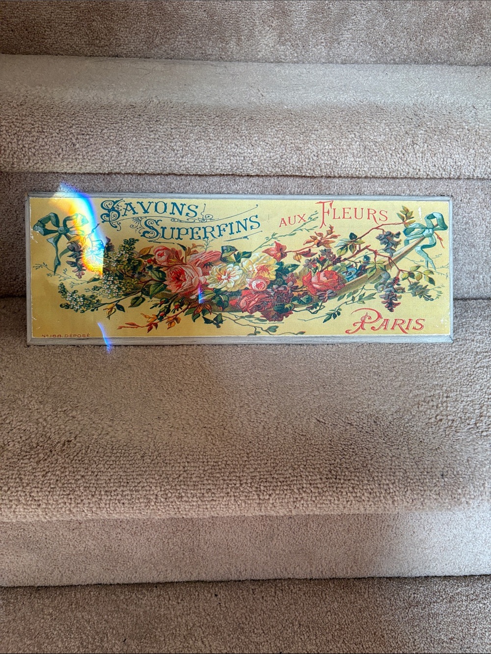 Vintage Floral 'Savons Superfins' Decorative Wooden Sign on Yellow Background